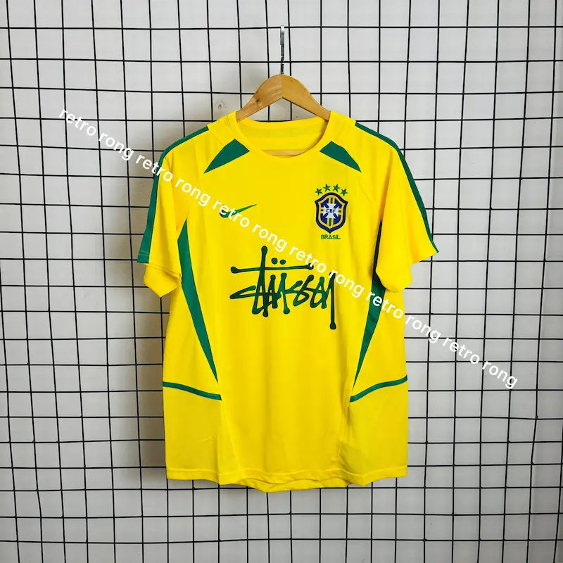 WhatsApp Image 2026-01-11 at 7.59.29 PM (1) Brasil 2002 Retro Home Kit - Stussy Edition (Premium Player Quality) - Image 1